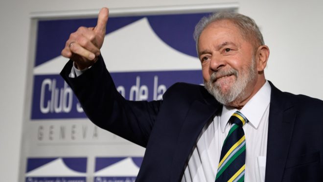 (FILES) In this file photo taken on March 06, 2020, former Brazilian president Luiz Inacio Lula da Silva gives a thumb up during an event titled: "Dialogue about inequality with global unions and general public" at the Geneva Press Club in Geneva. - A Brazilian Supreme Court judge overturned the graft convictions against former president Luiz Inacio Lula da Silva on March 8, 2021, clearing the way for the left-wing leader to run in the 2022 presidential election. (Photo by Fabrice COFFRINI / AFP)